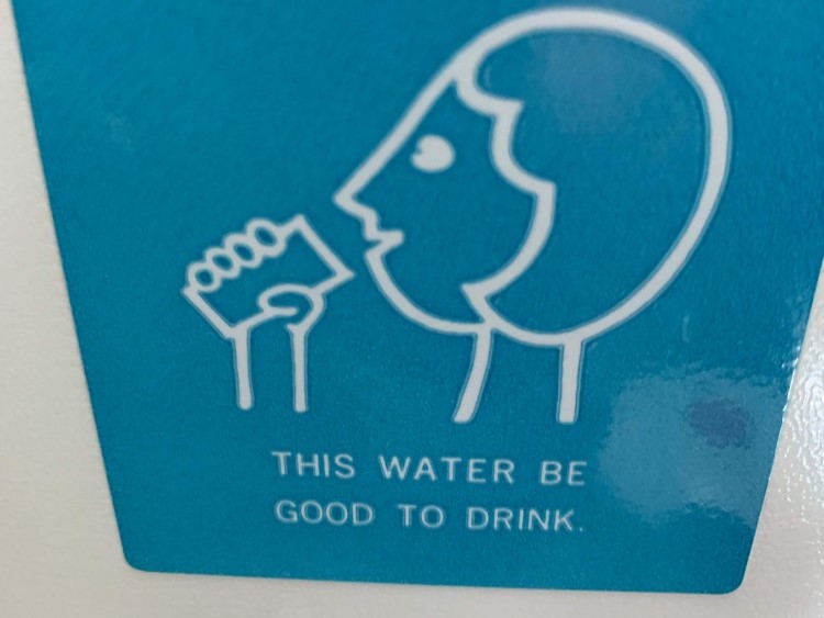 Sign with water begood to drink on it